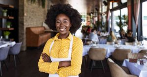 Tips For Small Business Owners, woman stands for pictures